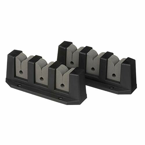 Pair of black rubber wheel chocks for stability.