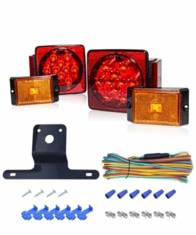 Trailer light kit with red and amber lights, wiring, and mounting accessories.